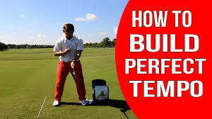  How to perfect your golf swing tempo at home.”- trainer doing golf swing tempo drills